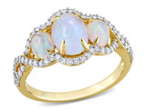 1.23 Carat (ctw) Ethopian Blue Opal Three Stone Ring in 10K Yellow Gold with Diamonds